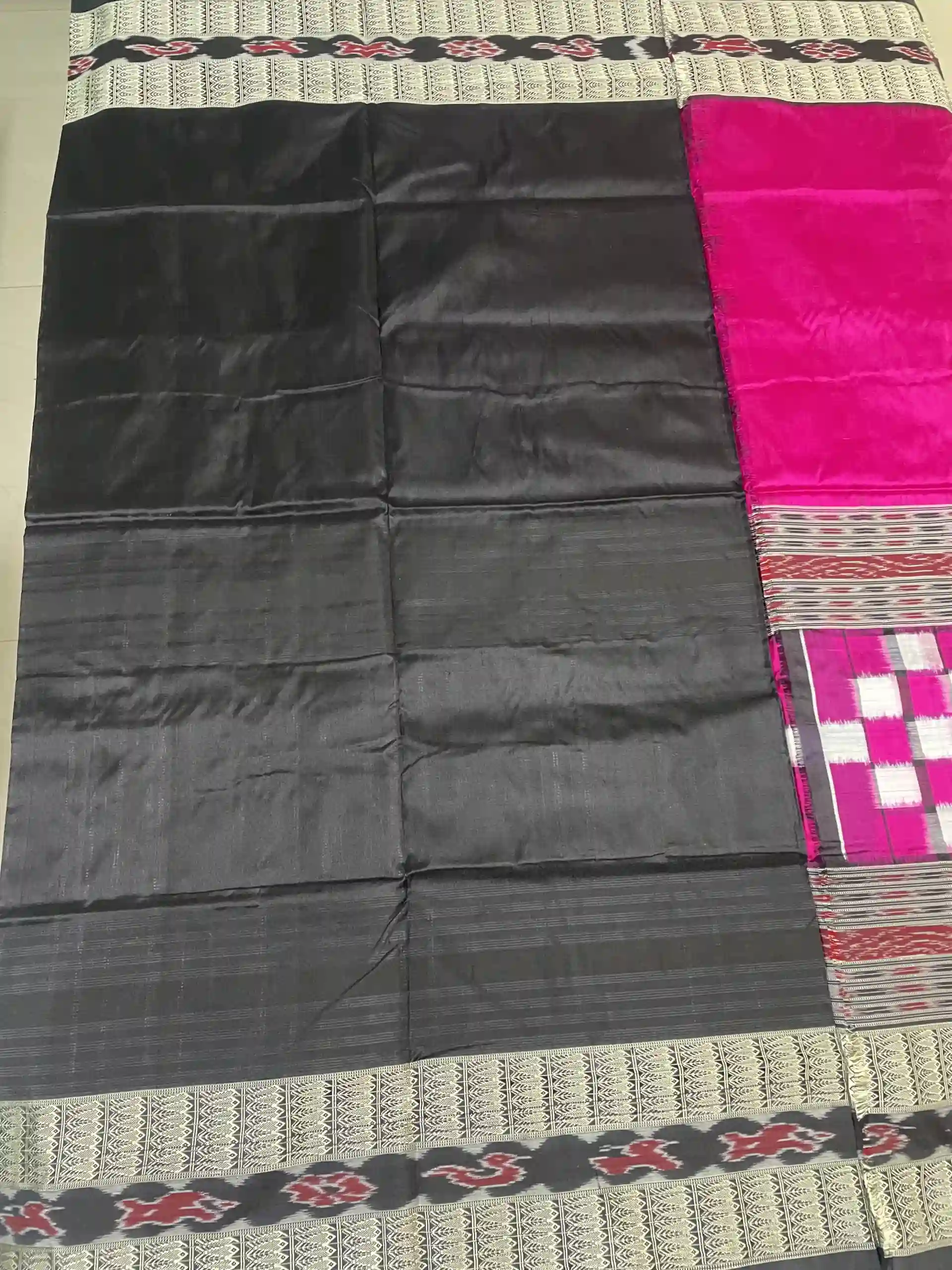 Plain black blouse with border design for hands
